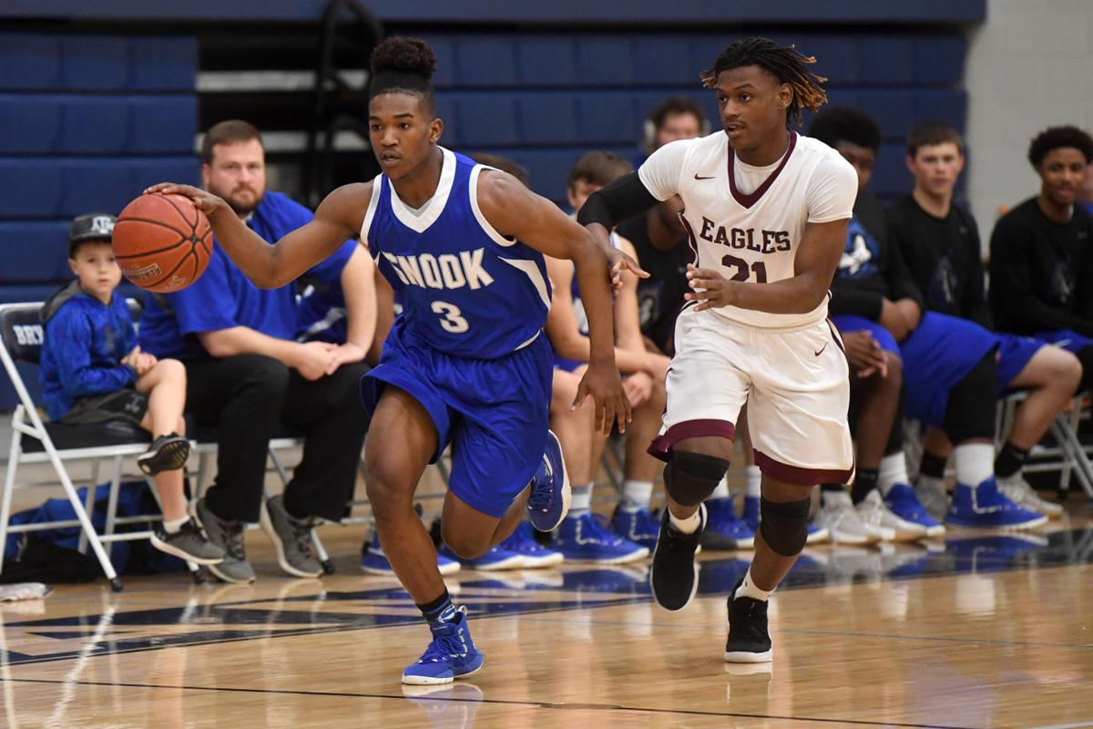 Photos Snook vs. Hearne boys' basketball Gallery