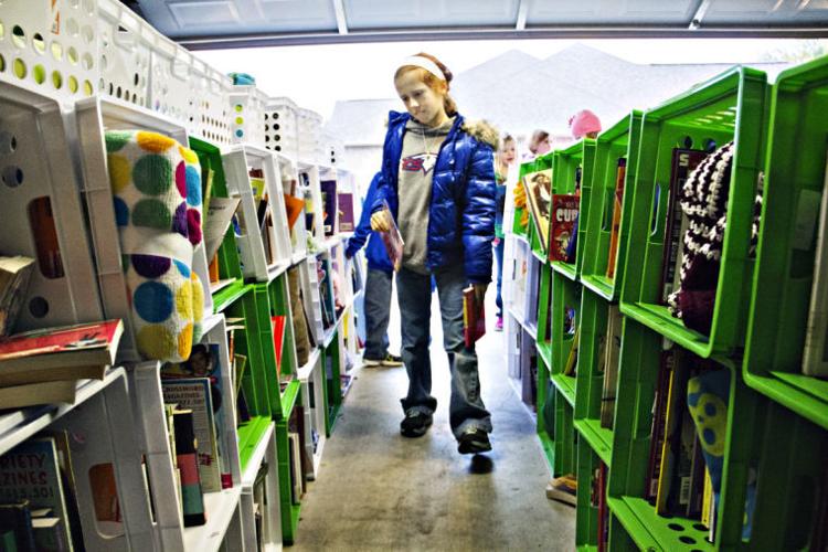 Books and a Blanket give gifts to those in need