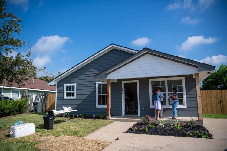 Bryan family receives new home from Habitat for Humanity