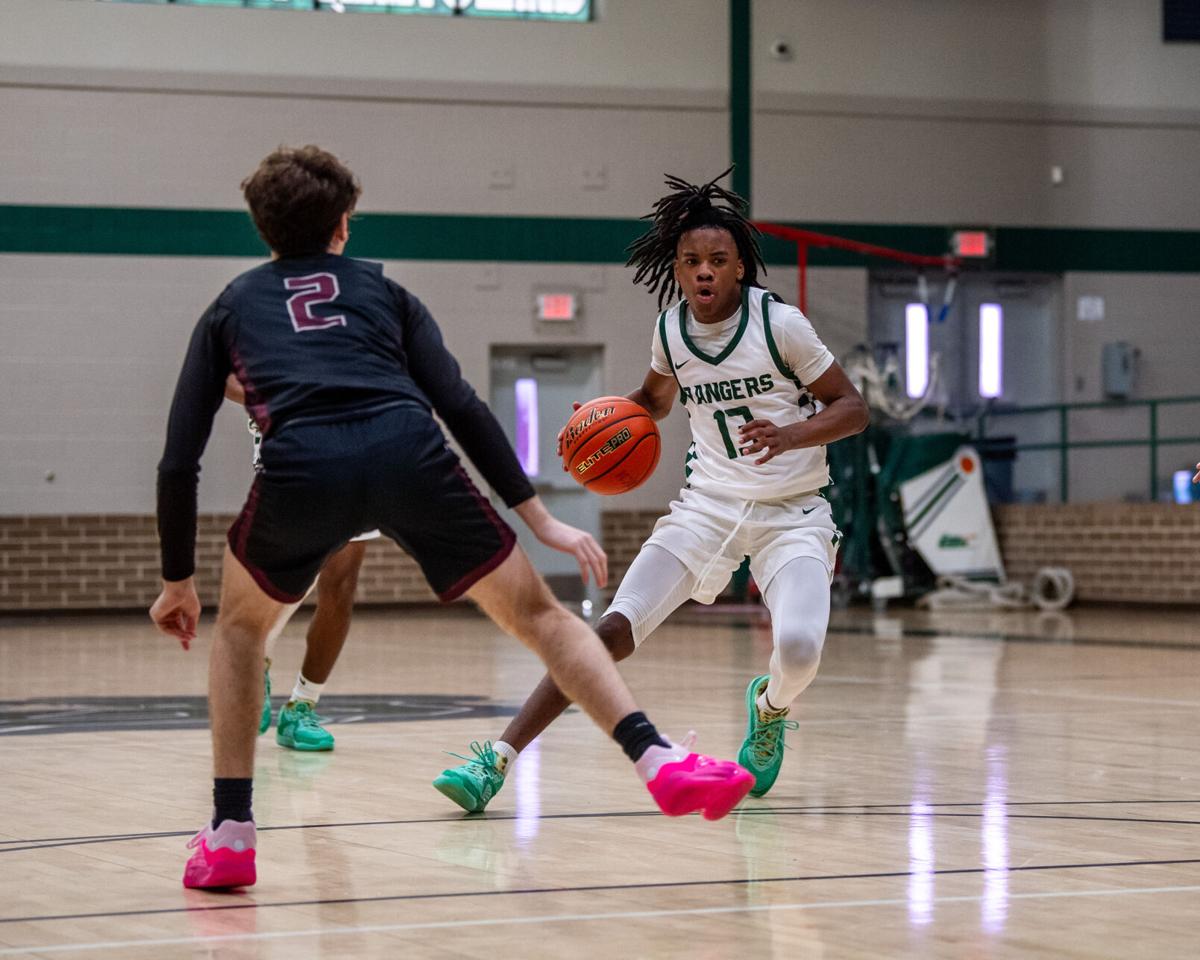 Rudder boys basketball team opens season with 45-41 win over Waller