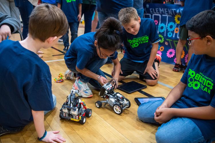 Professor delivers robotics workshop at Brazos County school