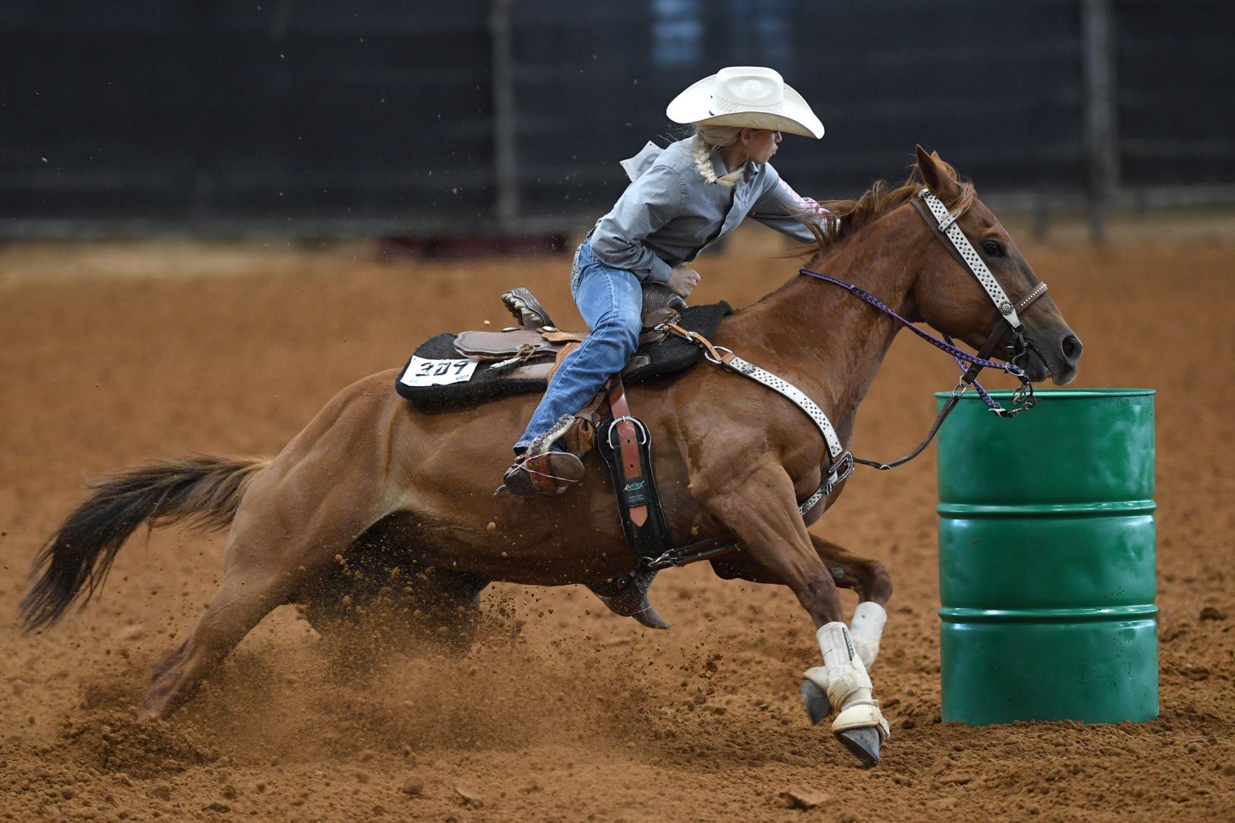 Gallery Barrel racing at the Texas State 4H Horse Show
