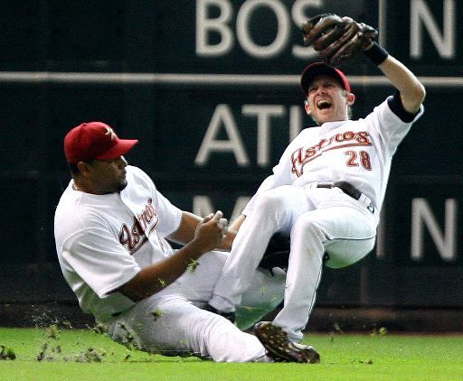 Houston Astros' Andy Pettitte, right, gets a hit against the Pittsburgh  Pirates to drive in a run in the fourth inning of a baseball game in  Pittsburgh on Saturday, Aug. 26, 2006. (