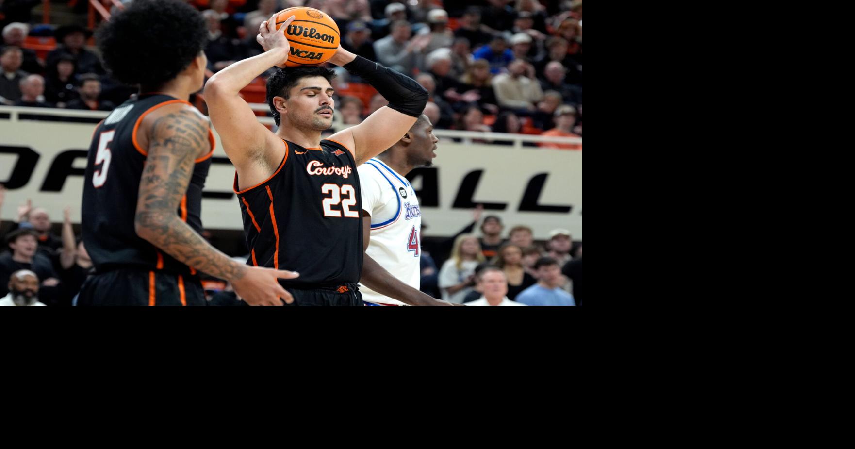 Oklahoma State Cowboys center Parsa Fallah (22) reacts during a men's college basketball game between the Oklahoma State Cowboys and the Kansas Jayhawks at Gallagher-Iba Arena in Stillwater, Okla., Wednesday, Feb. 18, 2026.