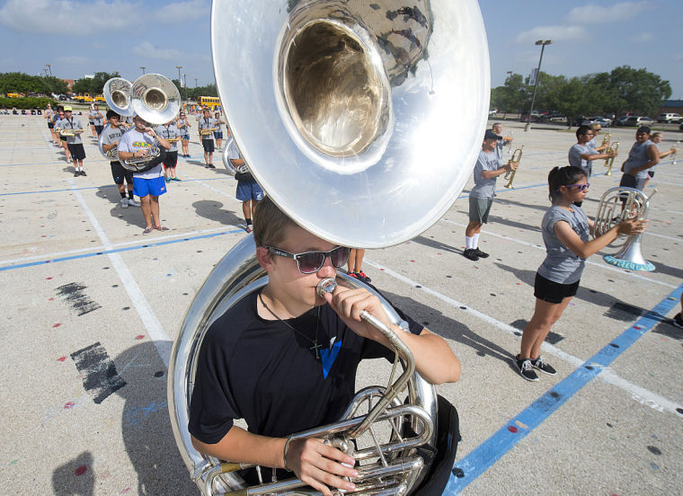 Reassignment of Bryan High School band director raises questions, draws