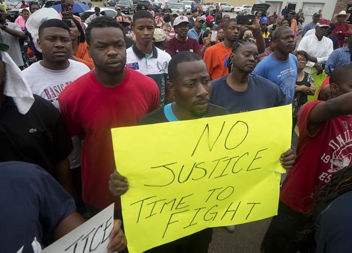 Hearne residents gather for peaceful protest outside police department