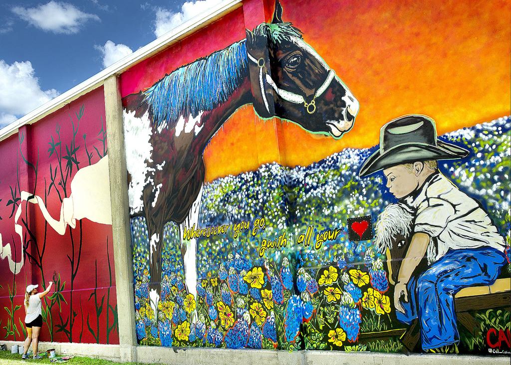 Painters Brighten Downtown Bryan Building With Series Of Murals