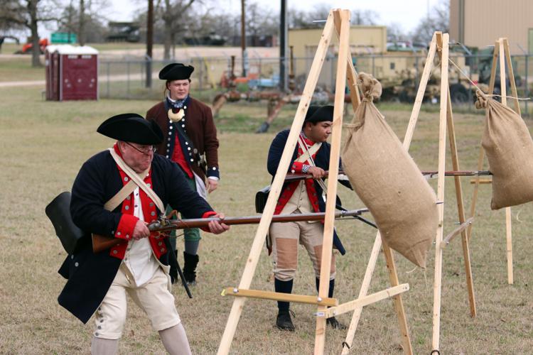 Reenactors engage crowd in Revolutionary War skills