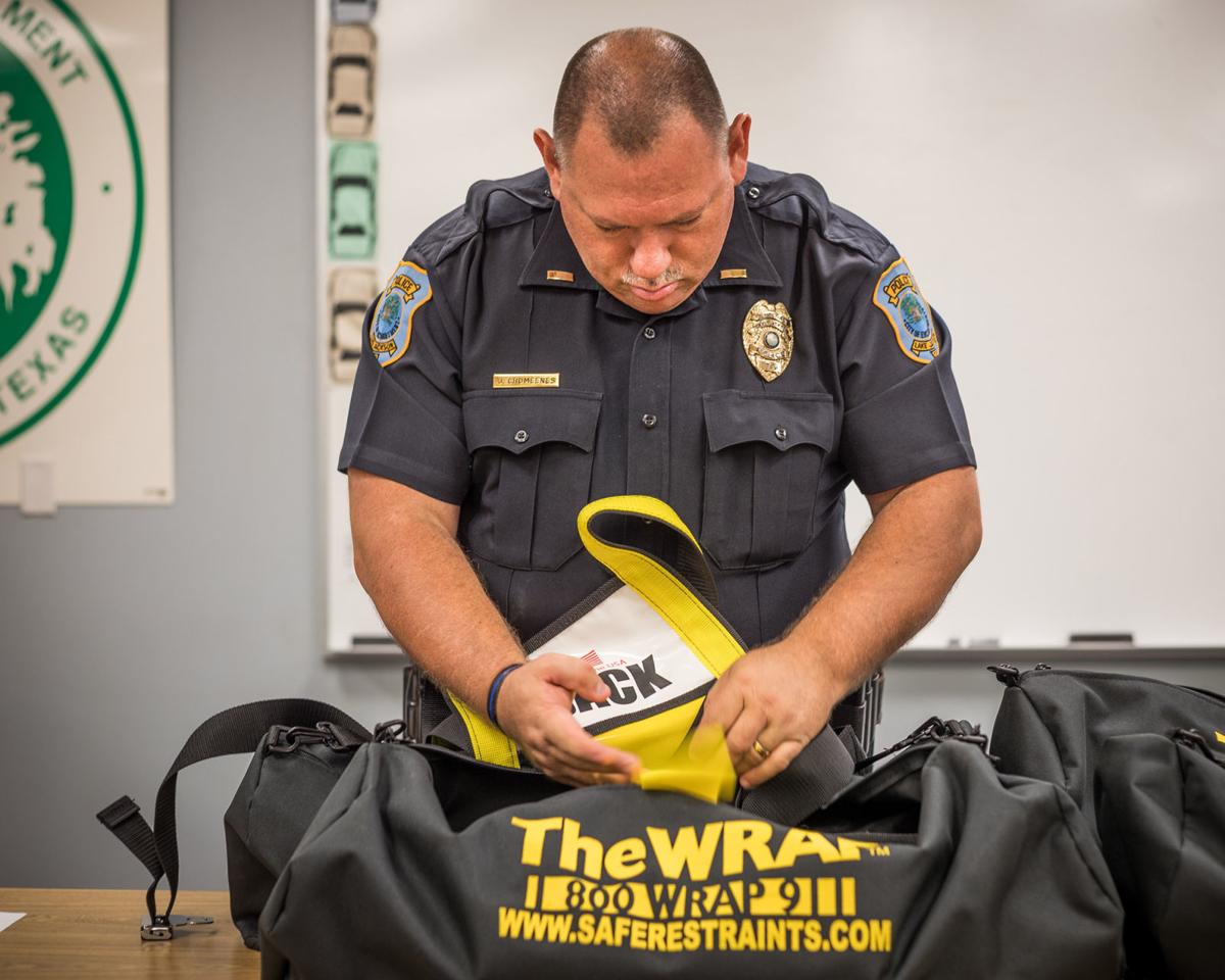 Fullbody harness restraints donated to Lake Jackson Police Department Brazos Living