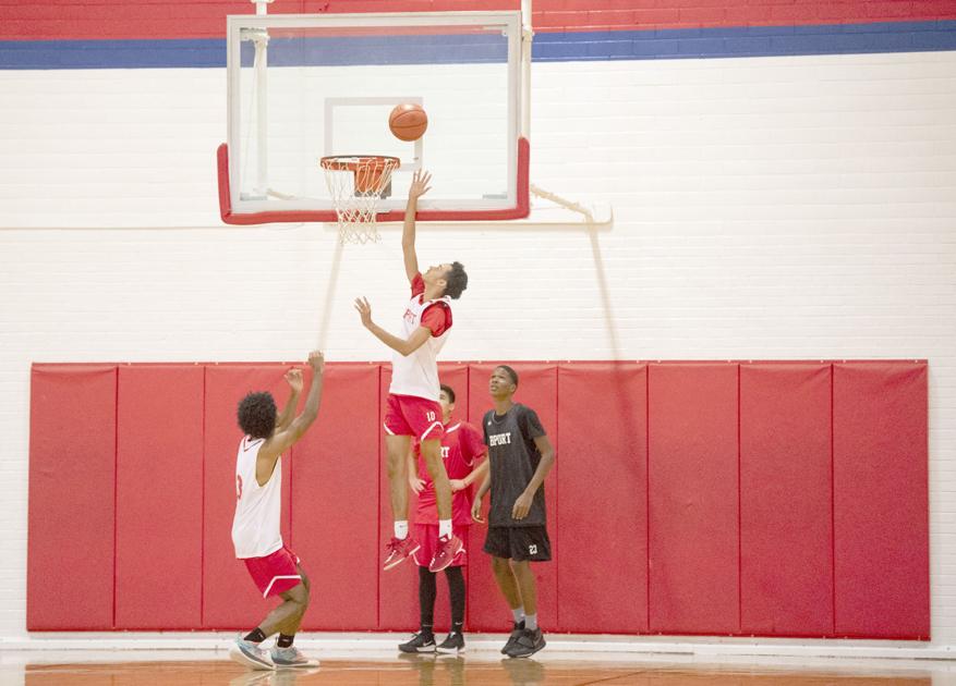 Boys hit the basketball court Sports