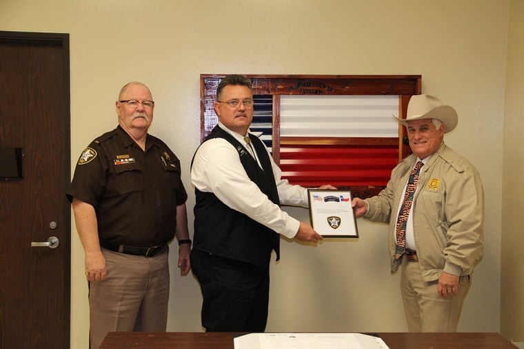 Brazoria County Cavalry presents Texas flag to Sheriff's Office News