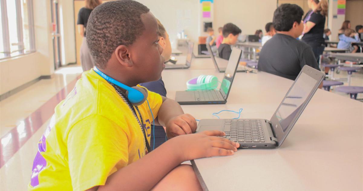 Local elementary school teaching computer programming skills to ...