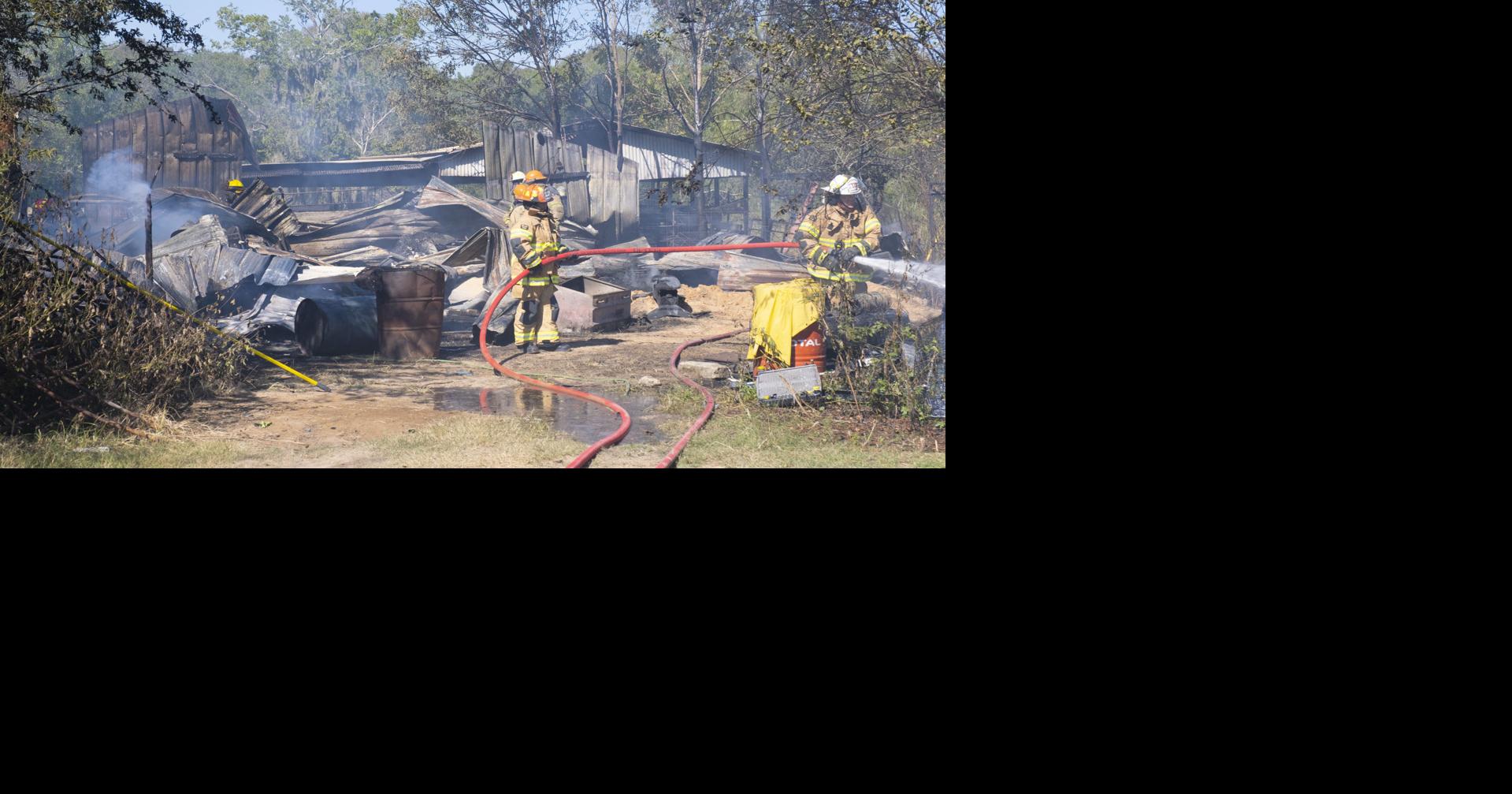 Rosharon barn engulfed from trash flames News