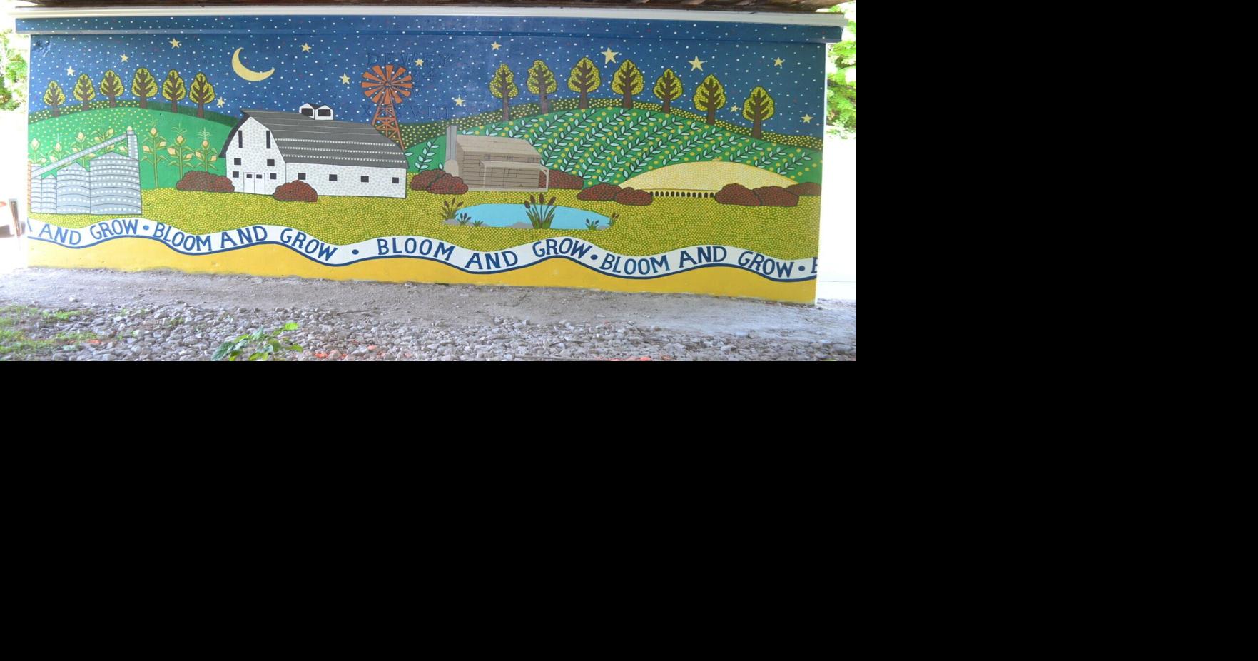 Fairfield artists paint mural on railroad underpass