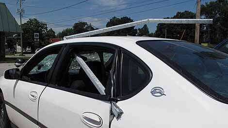 Post pierces man's car after crash into fence | News | thegazette.com