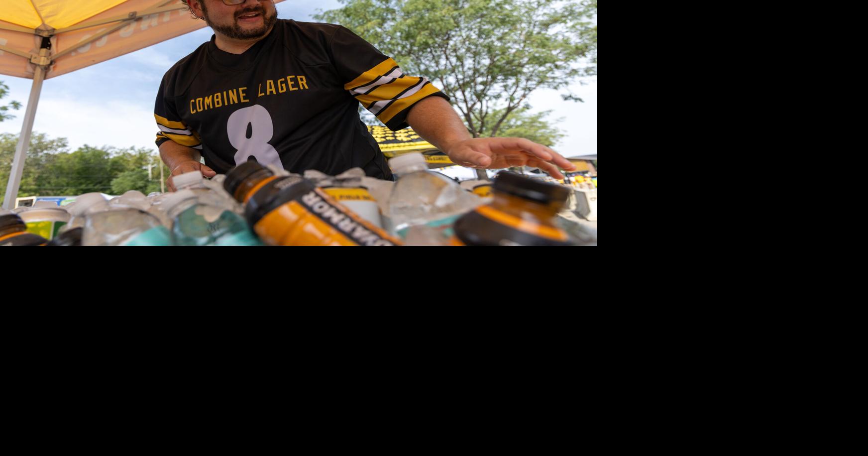 Tailgaters endure heat for scorching Hawkeye home-opener