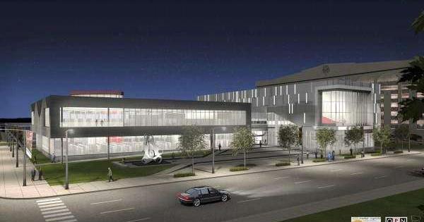 Director predicts users will love 'warm,' 'contemporary' library design ...