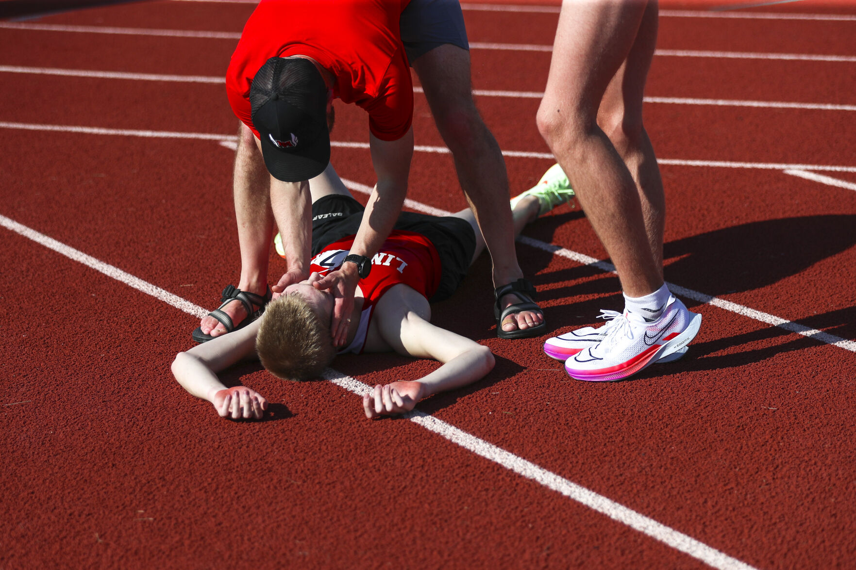 Photos: Class 4A Iowa high school state qualifying track and field in ...