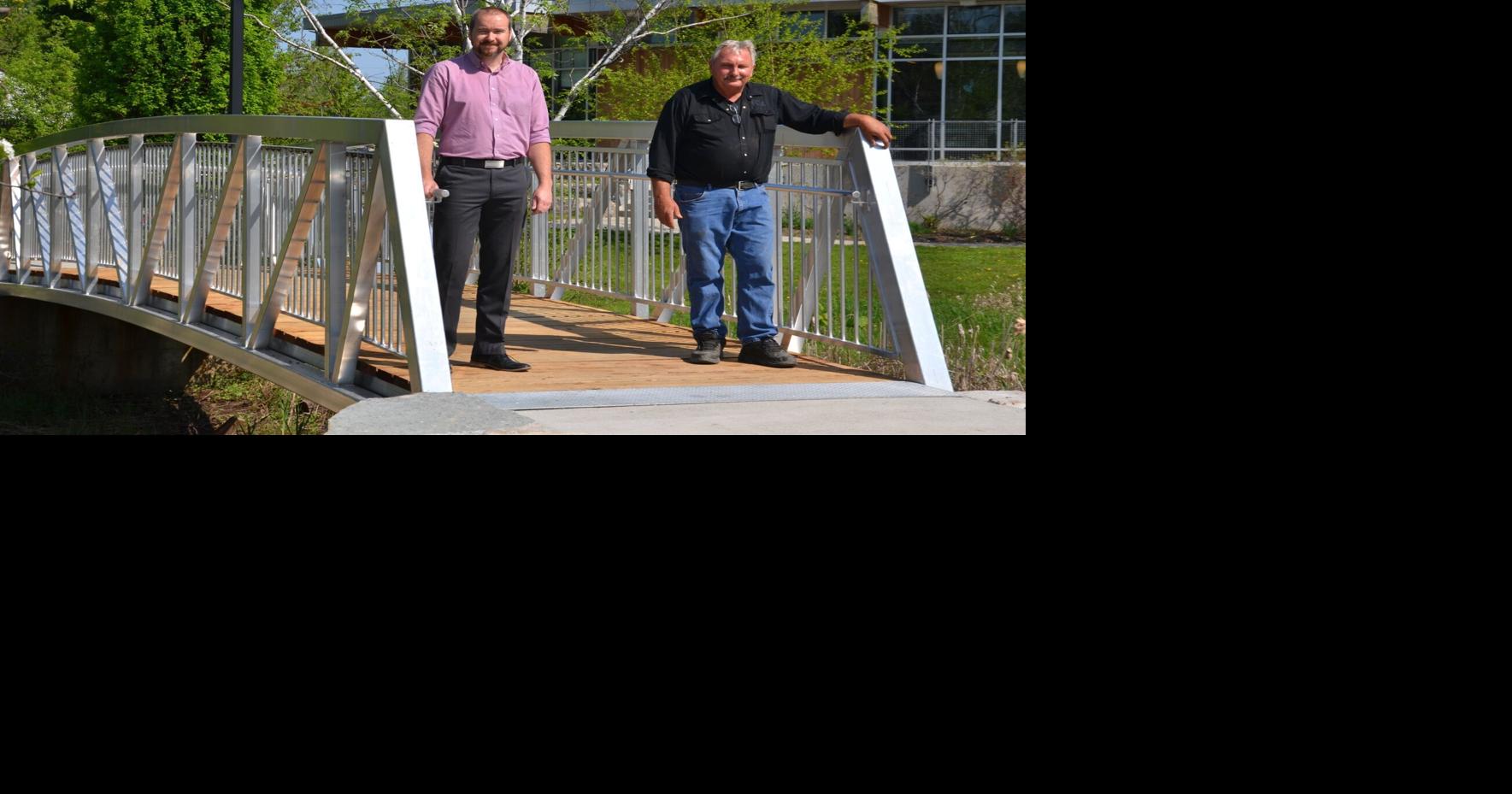 PHOTOS Acton library gets new pedestrian bridges