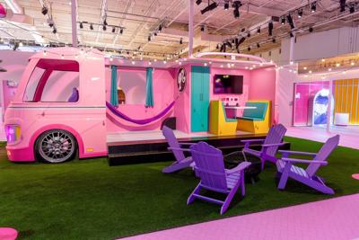 World of Barbie invites guests into a life-size version of Barbie's house and camper van.