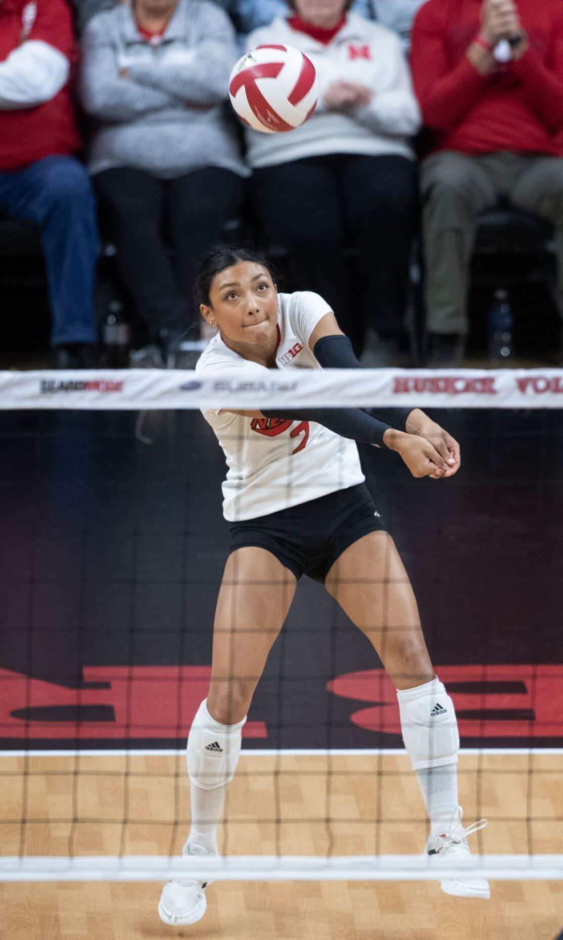 Why a police officer will travel to Nebraska with the Wisconsin volleyball  team