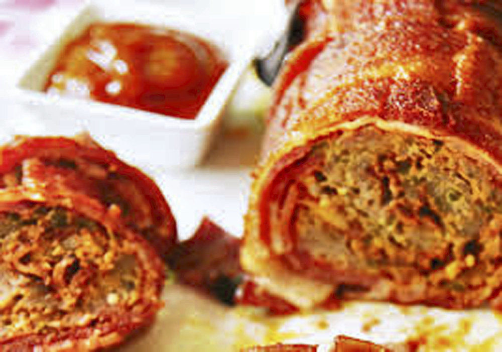 Bacon explosion hot off the grill is ideal way to celebrate football season
