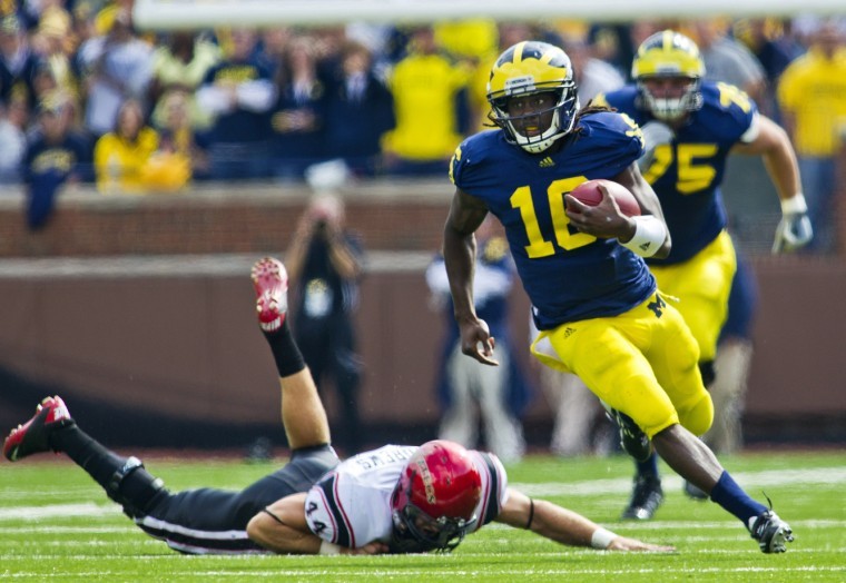 Denard Robinson says he can take Usain Bolt in a 40-yard dash. How