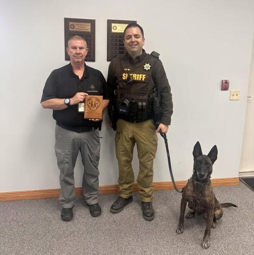 YSO dog teams evaluated, specialist honored for his service