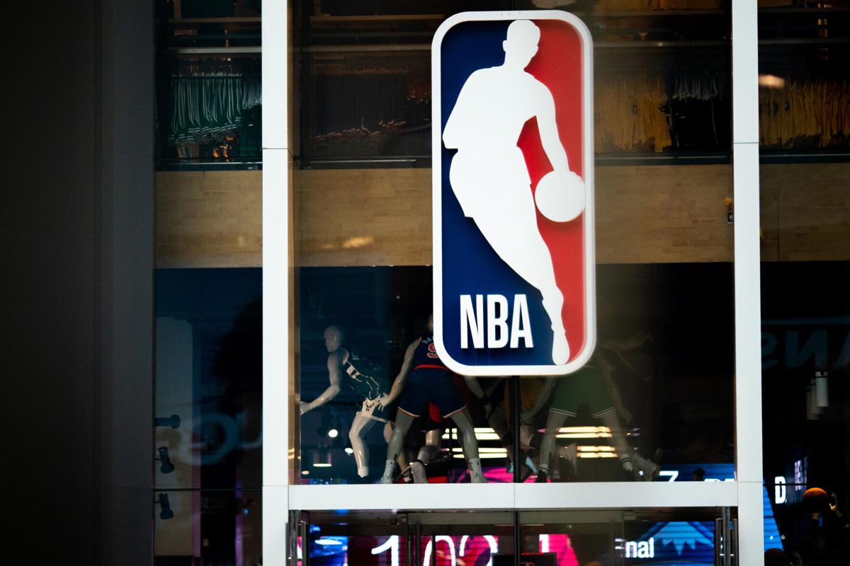 An NBA logo is shown at the 5th Avenue NBA store on March 12, 2020 in New York City.