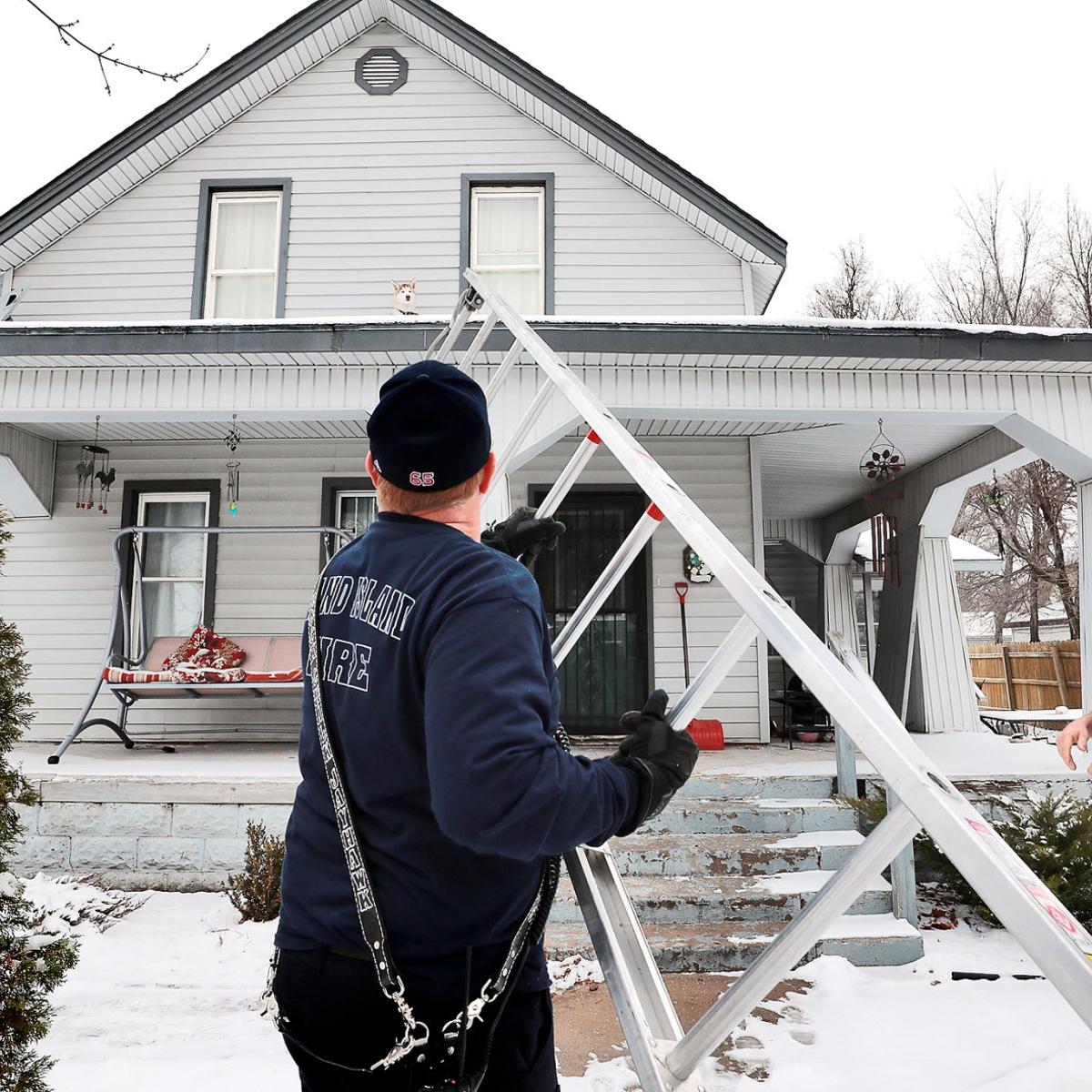 Grand Island Fire Department Rescues Dog On Roof Grand Island Local News Theindependent Com