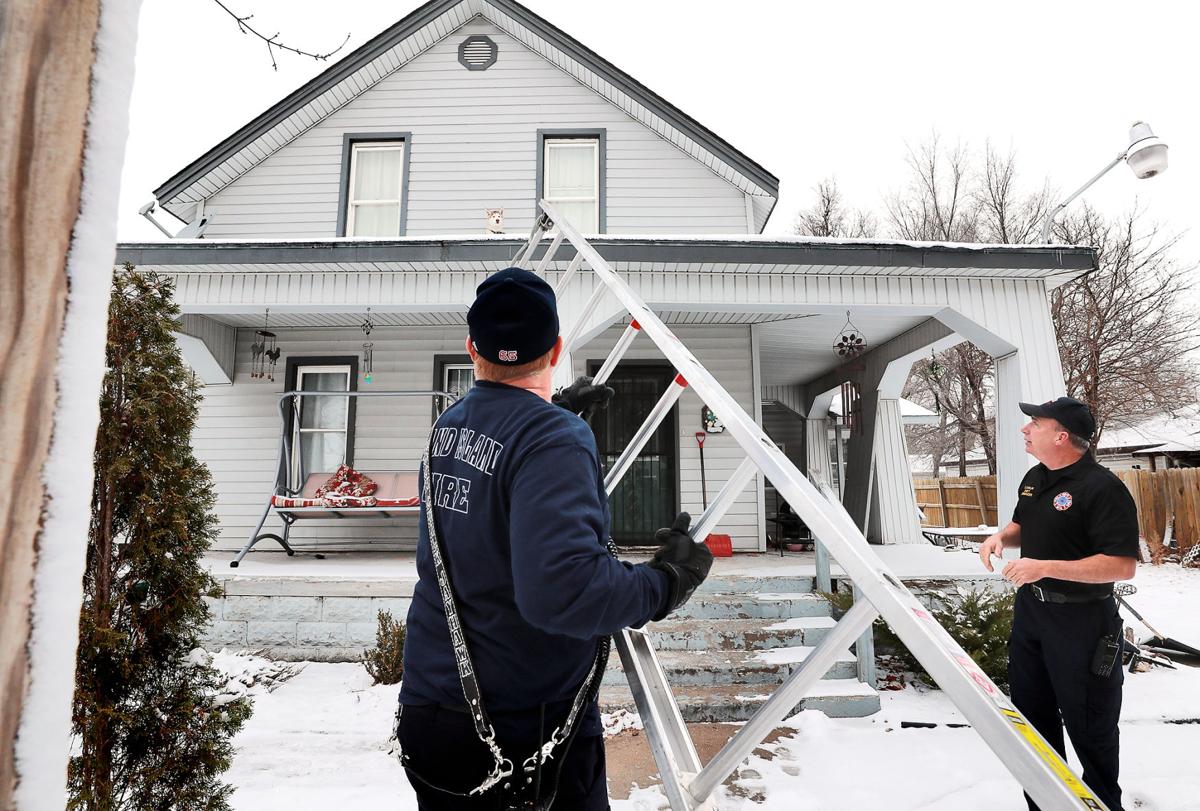 Grand Island Fire Department Rescues Dog On Roof Grand Island Local News Theindependent Com
