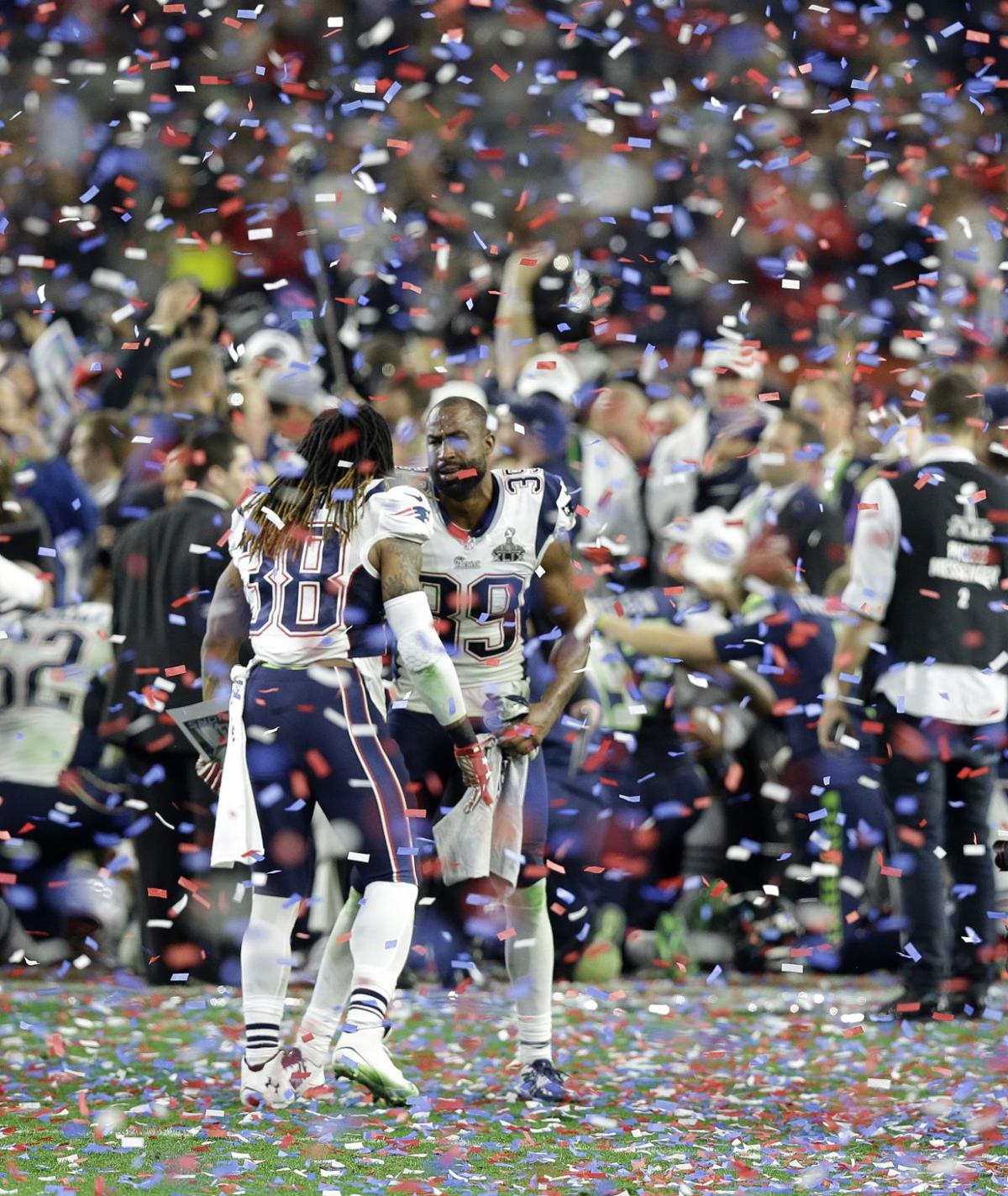 New England Patriots' Brandon Bolden (38) and cornerback Brandon Browner (39) celebrate after the Patriots beat the Seattle Seahawks in the NFL Super Bowl XLIX.