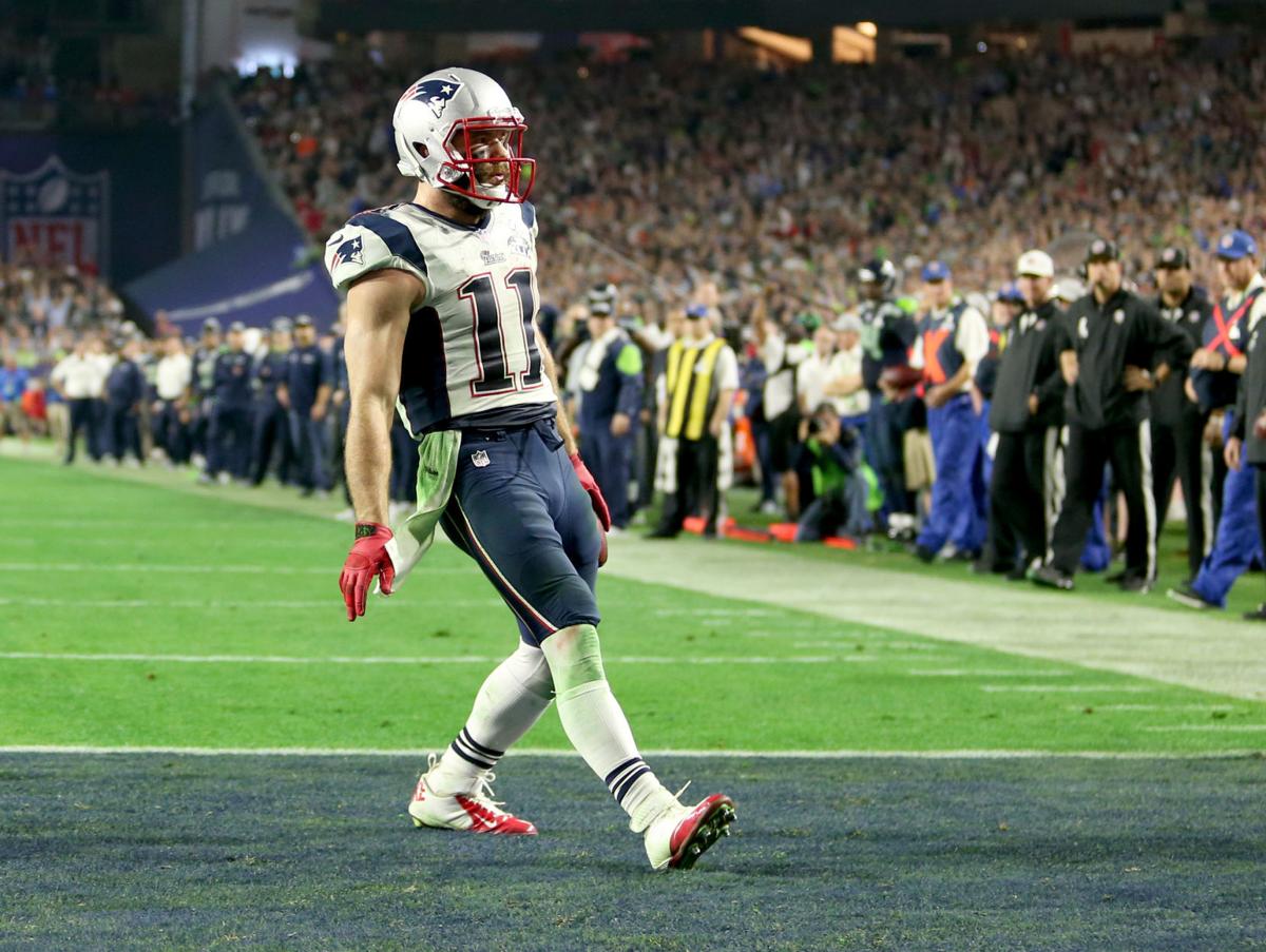 New England Patriots wide receiver Julian Edelman (11) celebrates as he scores a touchdown with just over 2 minutes left in the game.