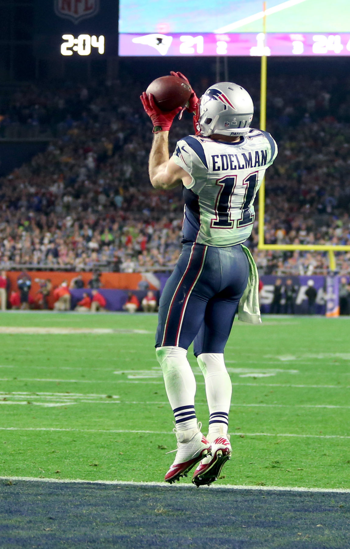 New England Patriots wide receiver Julian Edelman (11) catches an uncontested touchdown pass with just over 2 minutes left in the game.