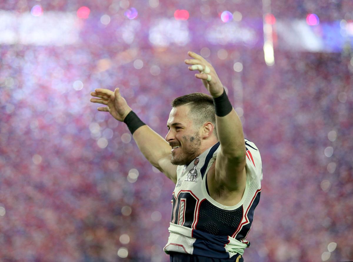 New England Patriots wide receiver Danny Amendola (80) celebrates as confetti flies after the Patriots defeated the Seattle Seahawks in Super Bowl XLIX.