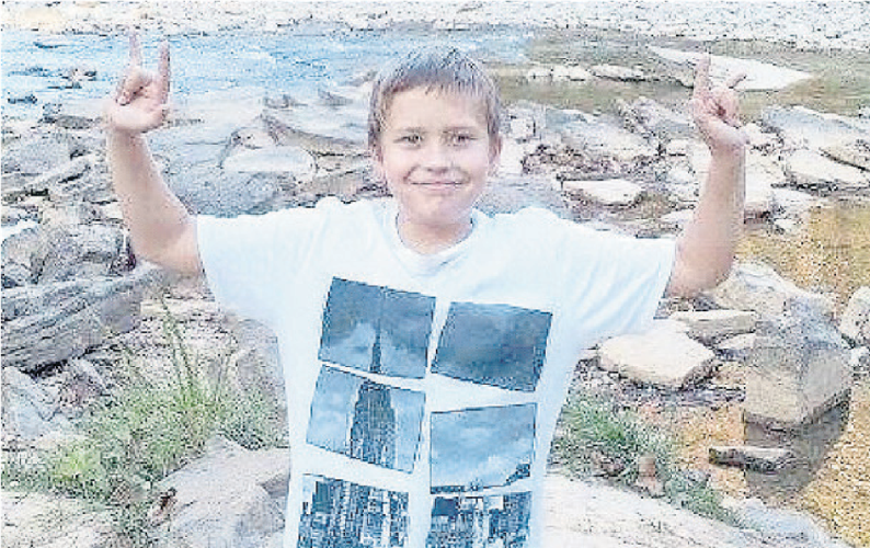 Tucker Phillip Wimpee throwing “I love you’s” to his  family.