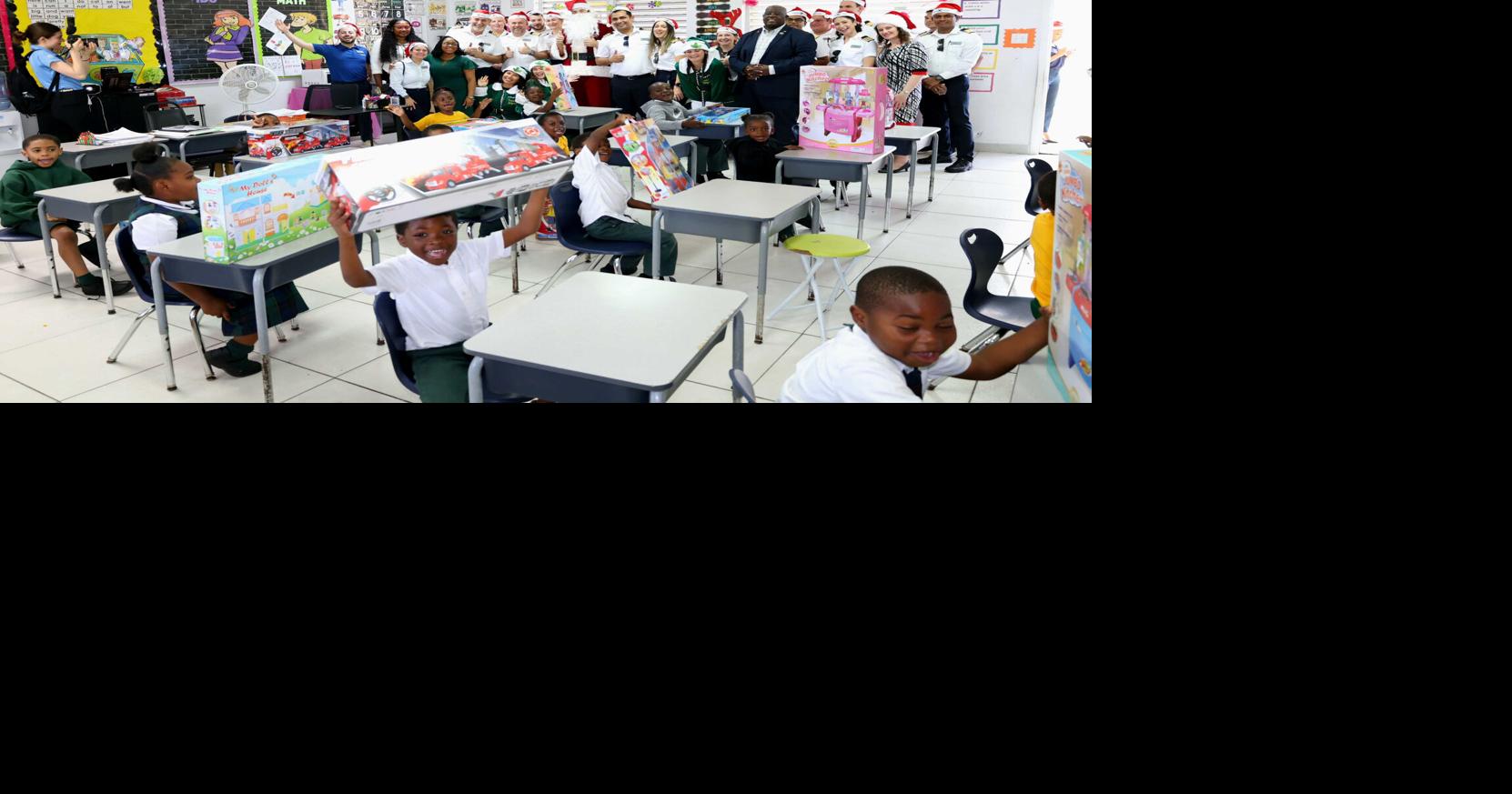 MOT and Celebrity Cruises bring holiday cheer to Hugh Campbell Primary School students