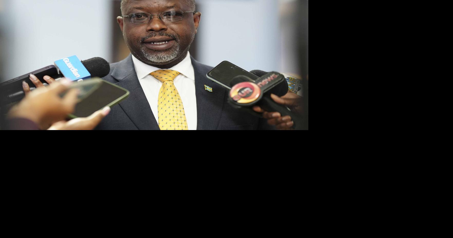 Munroe says he will reserve judgment on video of poachers