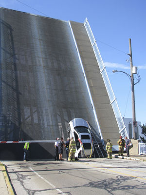 Vehicle trapped by rising bridge
