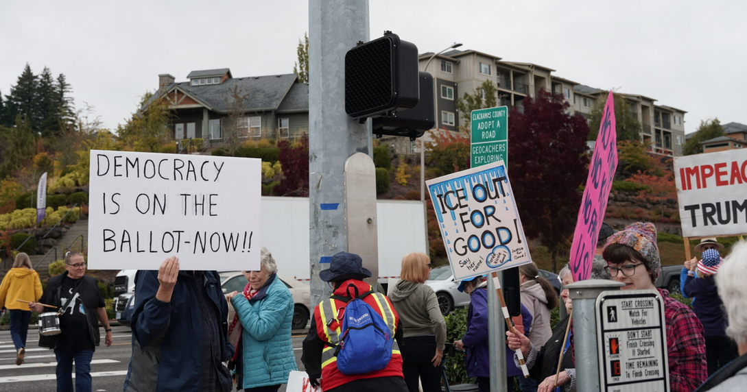 Oregonians urge early voting at statewide ‘No Kings’ protests ahead of election
