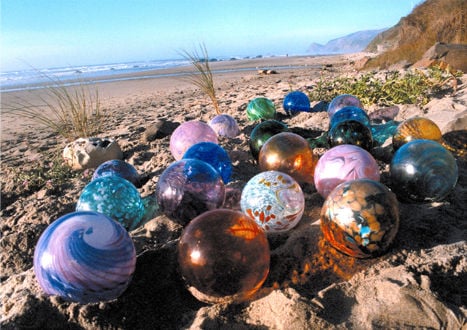 Beachcombers treasure glass floats for fishing nets