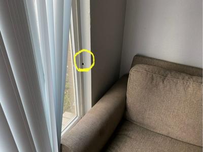 Gresham bullet hole