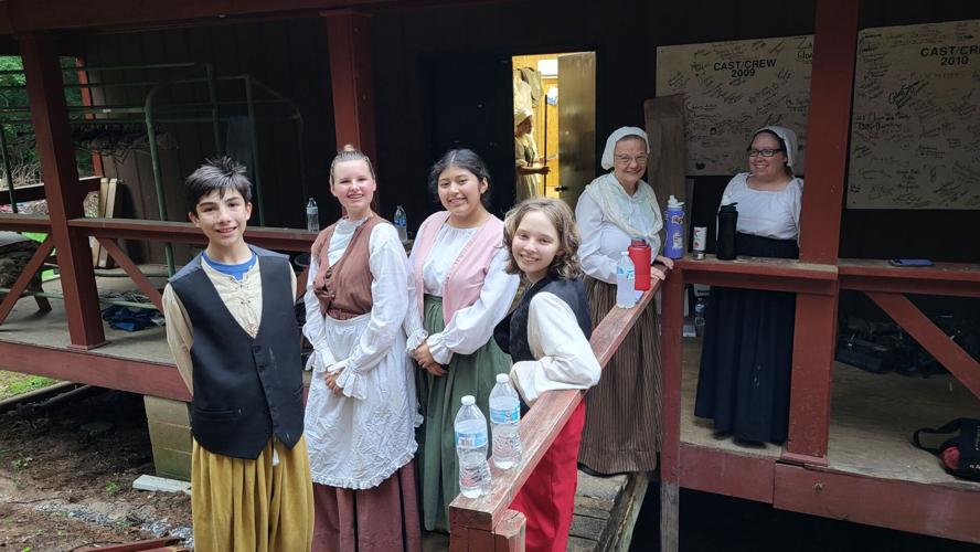 Actors backstage before the show