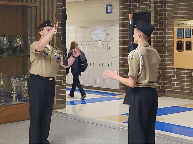 NJROTC students practice exhibition drills