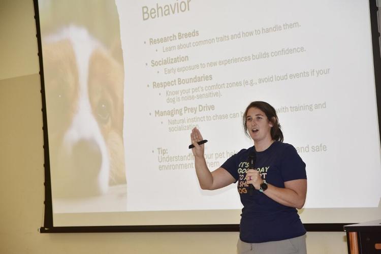 Burke Animal Services Director Kaitlin Settlemyre discusses how to be a good pet parent during Catawba Valley Healthy Families quarterly family event last week.