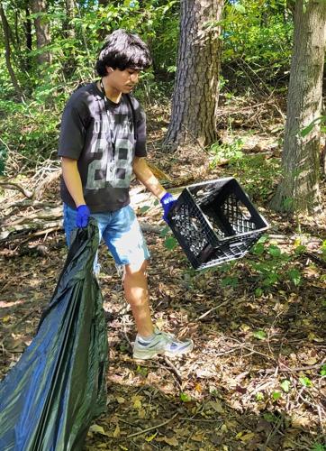 NCSSM athlete Gio Bonilla picks up garbage