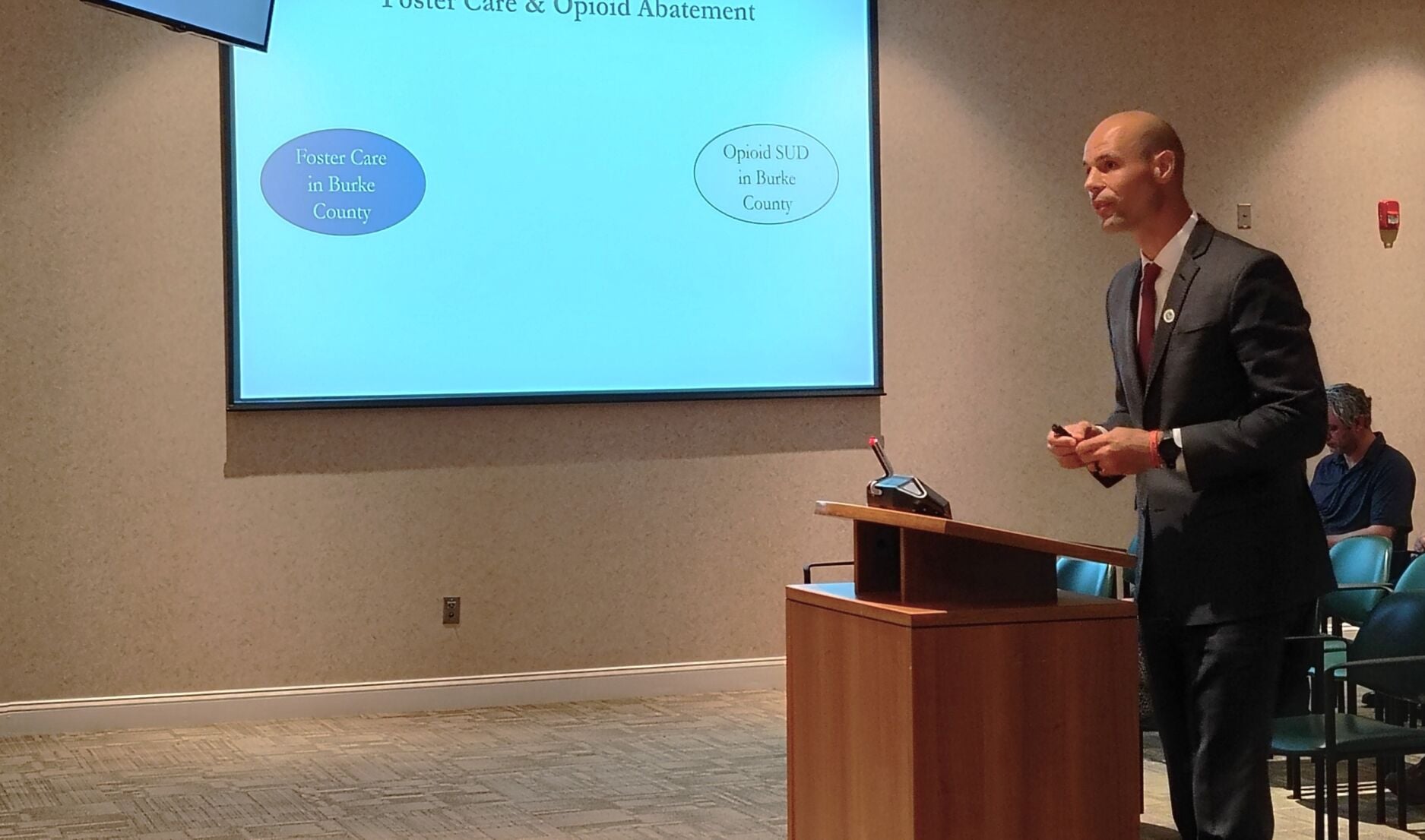County Manager Brian Epley gives a presentation on foster care