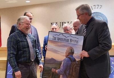 Burke commissioners surprise Alan Glines with retirement gifts