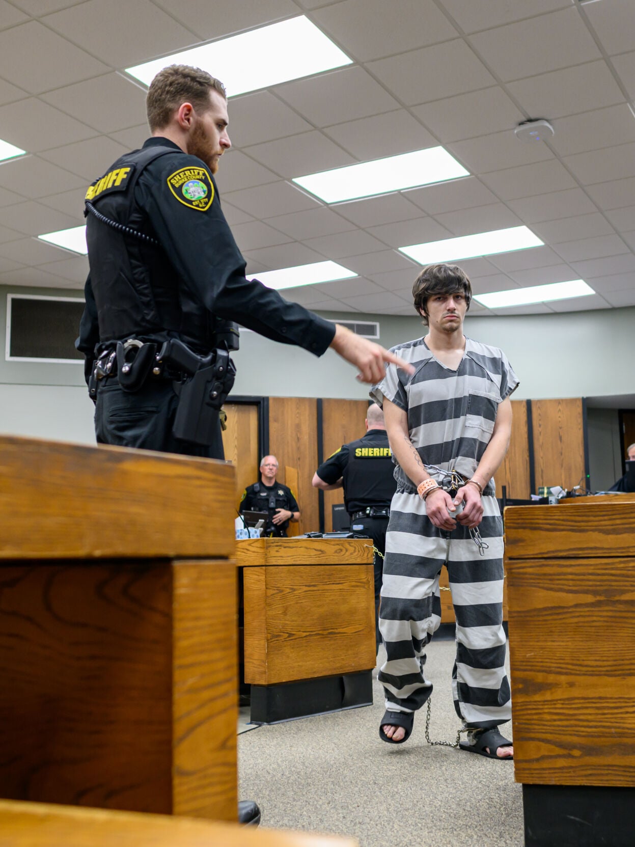Samuel Hensley leaving courtroom