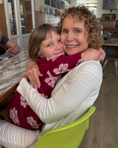 Karen Milner with orphan